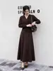 Falda de traje para mujer Feiyuan, elegante y estilosa, estilo casual de negocios para ir al trabajo, nueva falda de línea A versátil de color liso para otoño e invierno
