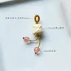 Precio mayorista directo de fábrica pulsera hecha a mano pulsera con colgante diy accesorios pequeños deslizantes colgante de garra de gato lindo Joker