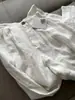 Vibras Elegantes y Relajadas, Lino Blanco Protector Solar, Caída Relajada, Pantalones de Pierna Ancha de Tiro Alto hasta el Suelo