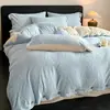 Conjunto de quatro peças de luxo leve de veludo de leite, espessado para o inverno, flanela, capa de edredom de veludo coral, lençol de cama, roupa de cama de inverno