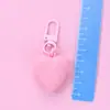 Llavero de corazón de melocotón nuevo color caramelo amor funda protectora aipods funda para auriculares colgante adornos para bolso