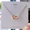 Colar Clássico de Trevo de Quatro Folhas em Aço Titânio Mais Vendido para Mulheres, Design de Nicho, Luxo Leve, Corrente de Clavícula Totalmente Cravejada com Zircônia Diamante