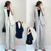 Em estoque: Conjunto de duas peças novo para o verão de 2026, top fashion sem mangas com decote V e calça casual de perna reta para o local de trabalho