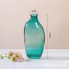 Vaso de Vidro Colorido Fresco Nórdico Vaso Pequeno Criativo para Mesa de Escritório Luxo Leve Simples Garrafa de Aromaterapia Fabricante Venda no Atacado