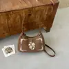 Bolso de mano literario estilo retro para mujer, con un diseño bordado de nota musical, un bolso tote fresco y versátil que se puede llevar en la mano, al hombro o cruzado, perfecto para el uso diario
