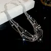 Collar de borla de calabaza de acero de titanio con piedra ojo de gato artificial, acero inoxidable y circonita, moda de lujo ligero, cadena para clavícula, collar de alta gama