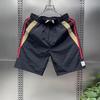 Pantalones cortos deportivos de verano para hombre, nuevos, de rayas de dos lados, a juego, versátiles, delgados y a la moda, para playa, pantalones cortos