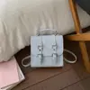 Bolso Pequeño Estilo Universitario 2026 Primavera Nuevo de Moda Elegante Bolso de Hombro Mochila Ligera de Viaje
