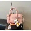 Bolsos de mano de gran capacidad al por mayor transfronterizos para mujer 2026 nuevo modelo bolso de hombro de alta gama para ir al trabajo bolso cruzado versátil moderno