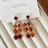 Ámbar Caramelo ~ Pendientes de Borla de Uva Maillard para Mujer Otoño e Invierno Lujo Ligero Pendientes de Gama Alta Pendientes Retro Exagerados