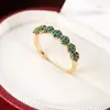 Comercio exterior transfronterizo nuevo diseño de moda europeo y americano nicho estilo de corte incrustado circonita colorida lujo anillo elegante