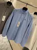 Camisa casual de manga larga para hombre, de algodón de bambú texturizado bordado, transpirable, nueva para primavera y otoño, color liso simple, amigable con la piel, transpirable