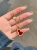 Tienda de oro con collar de calabaza incrustado de diamantes para mujer cadena de clavícula de ágata roja chapada en oro con colgante de unicornio de concha blanca lote minoritario coreano