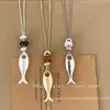 Collar de cuentas de pez plateado estilo coreano para mujer, lujo ligero con un toque de alta gama, accesorio de cadena para clavícula de acero de titanio con diseño de nicho