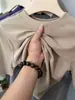 Camiseta elegante para mujer, de un solo hombro, con cuello mao pequeño y manga de tres cuartos, capa base versátil de color liso, elegante top interior de manga corta