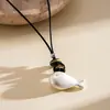 Collar de cordón de cuero vintage europeo y americano con peces, corazones y estrellas de cerámica, cadena minimalista y única para la clavícula, joyería de nicho