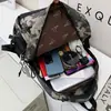 Mochila Escolar para Meninos do Ensino Fundamental Primeira Série Três a Seis Quatro Cinco Camuflada Impermeável Leve Grande Capacidade Mochila