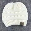 2017 Más vendido Otoño e Invierno Europeo y Americano ebay Amazon Etiquetado CC Gorro de punto de lana liso para la cabeza Gorro para la cabeza con cola de caballo para exteriores