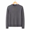 Camiseta de punto cálida para otoño e invierno, de cuello redondo, con estampado oscuro de jacquard rosa, para madres de mediana edad y mayores.