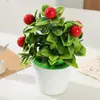 Planta artificial em vaso com flor de ameixeira de cinco folhas para decoração de mesa de jantar em ambientes internos. Ideal para decoração de interiores.
