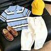 Conjunto Infantil Estilo Coreano para Niños 2026 Nuevo Estilo Universitario Seda de Hielo Manga Corta Polo Pantalones de Traje Casual Conjunto de Dos Piezas Moderno