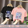 Camiseta de manga larga para niño, nuevo modelo primavera y otoño 2026, top estiloso para niños, camiseta base de moda de imitación de dos piezas para niños mayores