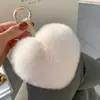 Colgante de Bolsa Lindo con Forma de Corazón de Piel de Conejo Llavero de Corazón de Felpa Bola de Piel con Forma de Corazón de Gama Alta Venta al por Mayor desde el Fabricante