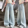 Traje Estilo Coreano Primavera/Otoño 2026 Nuevo Estilo Dulce y Lindo Chaleco de Punto de Dibujos Animados Camisa Jeans Conjunto de Tres Piezas