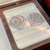 Pendientes de lujo ligeros europeos y americanos con forma de corazón de amor con doble C de circonita cúbica hueca, diseño de nicho, pendientes de pasador de plata, tocados de alta gama para mujer