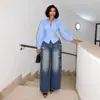 Ropa de mujer transfronteriza europea y americana 2026 otoño nuevo diseño elegante y juvenil camisa de manga larga a rayas con cuello camisero