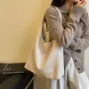 Bolsa vintage de grande capacidade para mulheres, novo modelo de outono 2026, bolsa de ombro simples e versátil, bolsa casual estilo coreano para trabalho e deslocamento