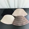 2026 Novo Chapéu de Pescador Fashion com Proteção Solar Estilo Coreano Pérola Vazada Respirável Chapéu Bucket Que Faz o Rosto Parecer Menor e Mais Sofisticado