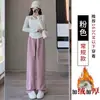 Pantalones de mujer de pierna ancha, holgados, a la moda y casuales, de cintura alta, con finas rayas, bolsillos y un diseño de pierna recta y fluido, hechos de terciopelo de algodón, para otoño e invierno 2026