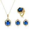 Aliexpress Nuevo Color Conjunto Tesoro Colgante Azul Profundo Collar Femenino Celebridad Europea y Americana Pendientes Elegantes Anillo de Industria Pesada