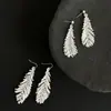 [Pluma Inteligente] Ganchos para Orejas de Pluma de Cisne Hechos a Mano con Cuentas, Pendientes Brillantes, Pendientes de Borla Geniales para Mujeres