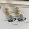 Brincos de Tarraxa Estrela de Cinco Pontas Saturno com Esmalte de Imperatriz e Zircônia Microincrustada com Gota de Óleo, Brincos Versáteis de Moda de Luxo Leve