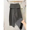 Pantalones casuales de estilo coreano de dos piezas falsas para mujer con diseño de lazo en la espalda, nuevo modelo de verano 2026, pantalones de pierna ancha de color liso simple