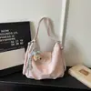 Bolsa Casual Retro Simples de Grande Capacidade Feminina 2026 Nova Primavera para o Trabalho Senhora Ombro Único Transversal Bolsa Tote