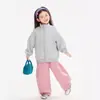 Ropa para niños Nuomi Wanzi versión coreana con pequeños iconos estampados, chaqueta para niñas con cuello alto, sudadera para niños con cremallera otoño 2026