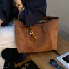 Bolsa de mano coreana para mujer de gamuza retro nuevo terciopelo bolso de mano de otoño con colgante de moda exquisito de un solo hombro bolsa de día 2026 gran capacidad