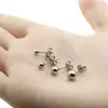 Estilo japonês e coreano novo brincos de aço inoxidável furos na orelha pinos de orelha simples contas redondas brincos de touca fabricantes femininos atacado