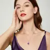 Huevo de Paloma Ovalado Zircón Morado Oscuro Completamente Diamantado Lujo Accesible Colgante de Gama Alta Joyería Regalo para Cena de Negocios
