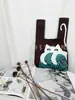 Bolso nuevo de punto fly bolso de mano para mujer bolso cubo de lana tejido bolso tote casual versátil de mano estilo japonés y coreano bolso para lonchera