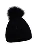 Novos estilos de outono e inverno de gorros infantis de tricô trançado, disponíveis na Amazon para vendas transfronteiriças, em cores sólidas com pompons, proporcionando calor e proteção contra o vento