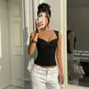 Camiseta sin mangas con cuello en V estilo chica picante, elástica ajustada a la cintura que realza la figura, tirantes anchos sin mangas para mujer, suministro mayorista europeo y americano