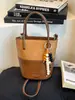 Bolso Cubo de Mujer Más Vendido Transfronterizo 2026 Nuevo Bolso de Hombro Versátil con Bloques de Color, Sensación de Alta Gama y Bolso Cruzado de Lujo Ligero