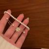 Entrada Francesa Lujo Flor de Camelia Perla Pulsera de Dos Piezas Elegante Elegante Diseño Sensación Pulsera Exquisita Joyería de Moda para Mujeres