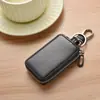Estuche universal multifuncional para llaves con diseño de explosiones transfronterizas, práctico estuche para llaves de coche con cierre y control remoto de acceso.