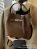 Bolsa Carteiro Saco de Balde Feminina Outono e Inverno 2025 Nova Versátil Fashionável e Exquisiteira Design de Nicho para o Trabalho Bolsa de Ombro