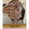 Enviado. Chic coreano, chaqueta sudadera a rayas versátil, top de moda de otoño de corte holgado para mujer, estilo 25561